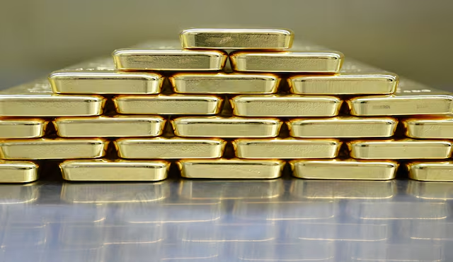 Gold bars and coins in the safe at Pro Aurum gold house in Munich